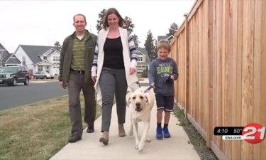Rescued dog Nash and new family