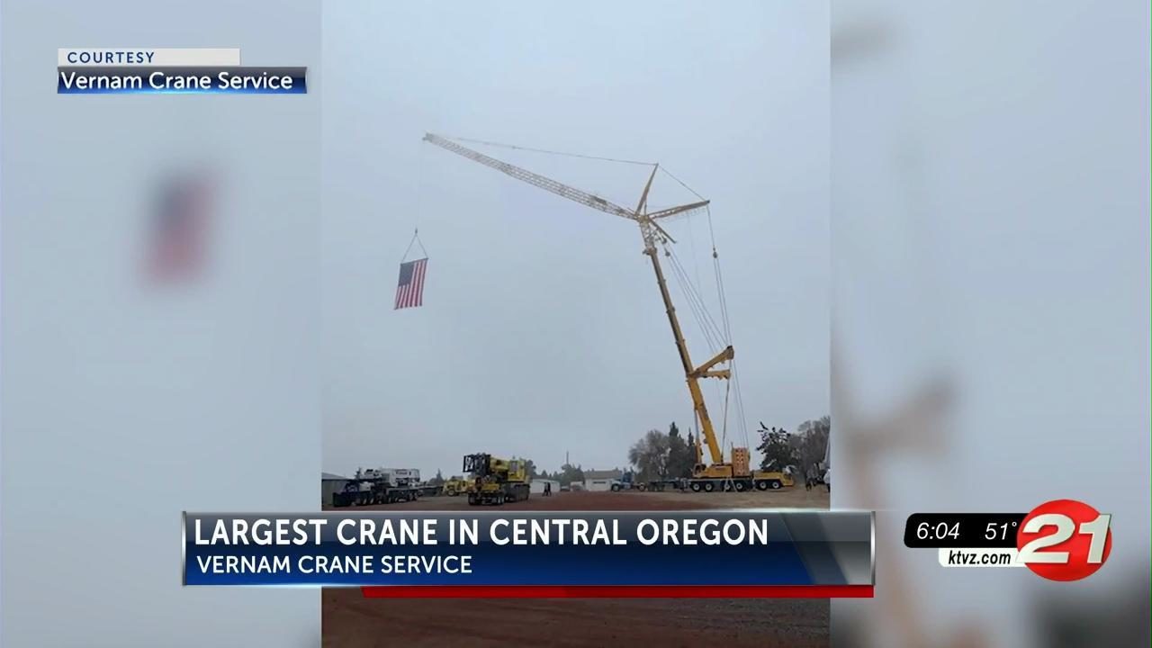 Crane with 100-foot jib was decked out for Veterans Day and is being tested for Mirror Pond Dam  maintenance work