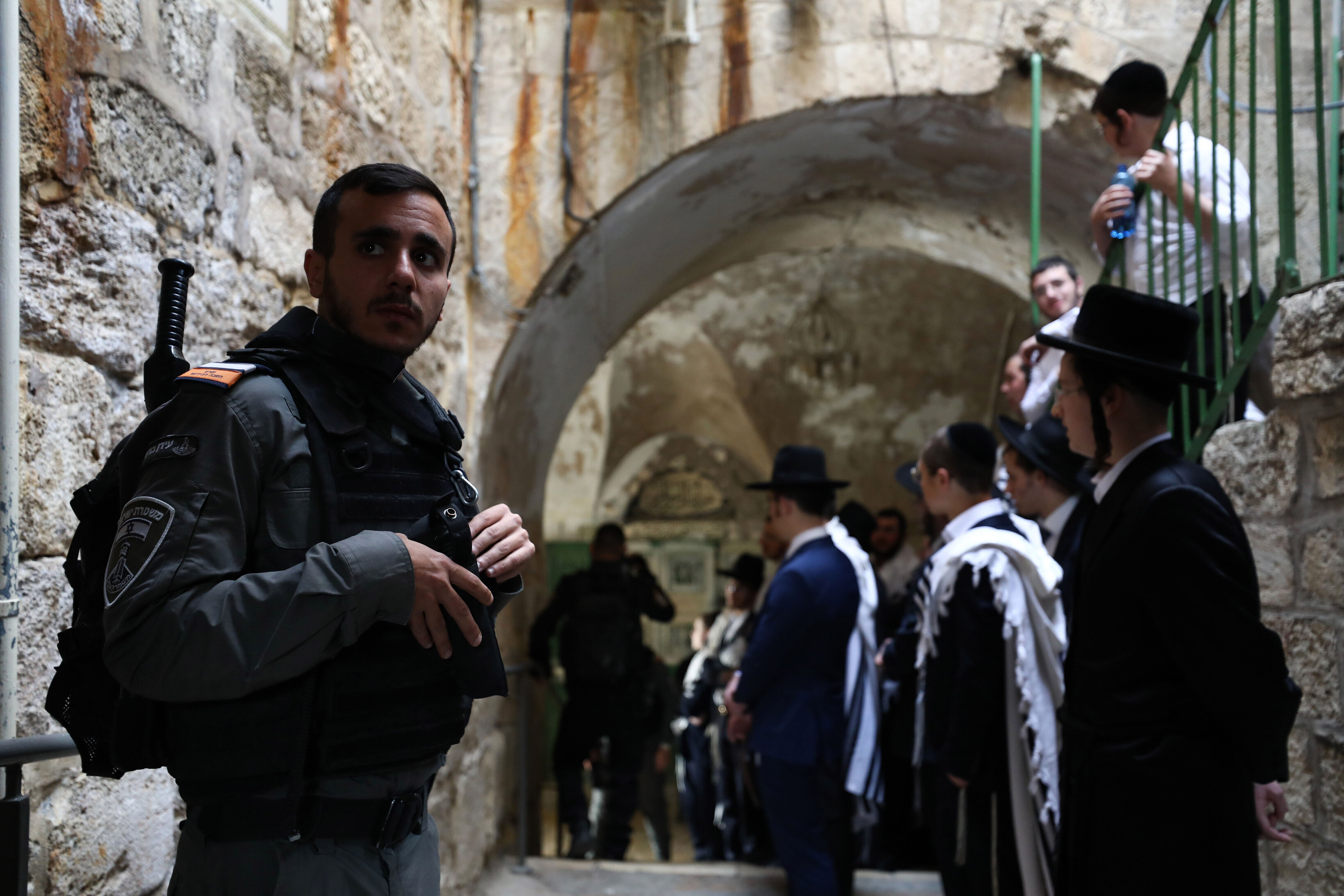 Jewish settlers escorted by Israeli forces enter Al-Aqsa Mosque compound in Jerusalem on April 18.