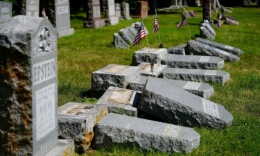 Many of the 176 gravestones that were vandalized at the cemeteries had American flags