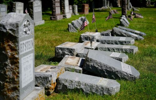 Many of the 176 gravestones that were vandalized at the cemeteries had American flags