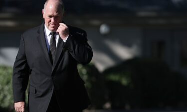White House "Border Czar" Tom Homan walks toward reporters before answering questions outside the White House on September 8 in Washington